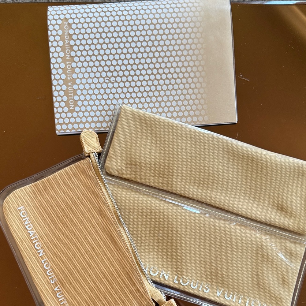 Louis Vuitton Beige and Tan Pouch Trio
